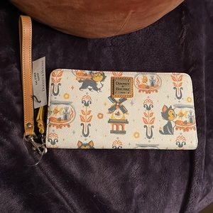 Dooney & Burke Pinocchio wristlet NWT!!